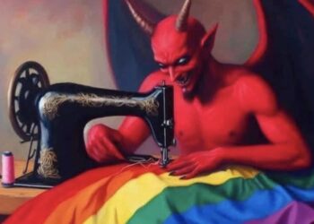 La propaganda dell’odio trasforma i simboli della libertà in emblemi del male. E Satana cuce la bandiera della pace.